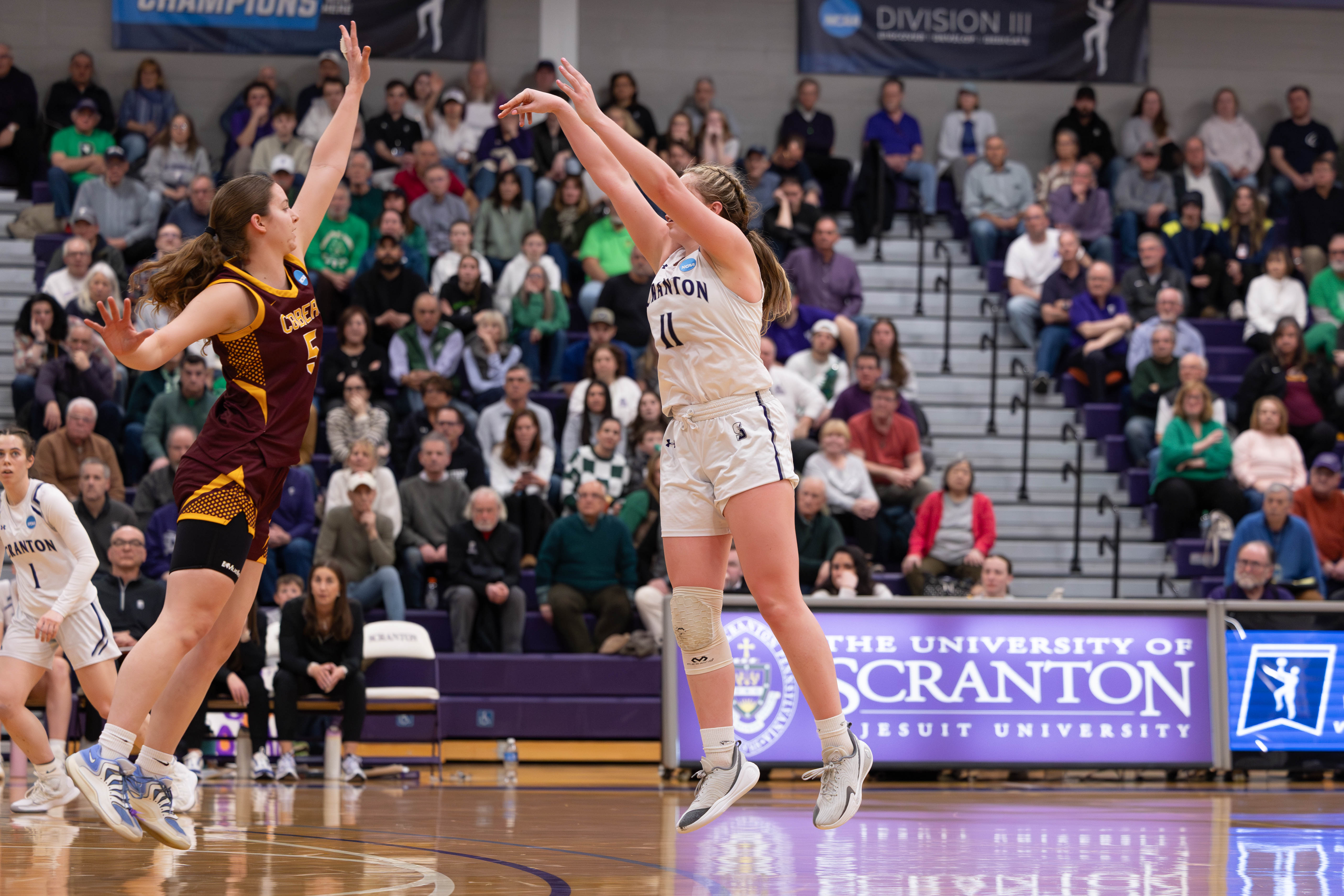 The University of Scranton’s Kaci Kranson takes a 3-point shot...