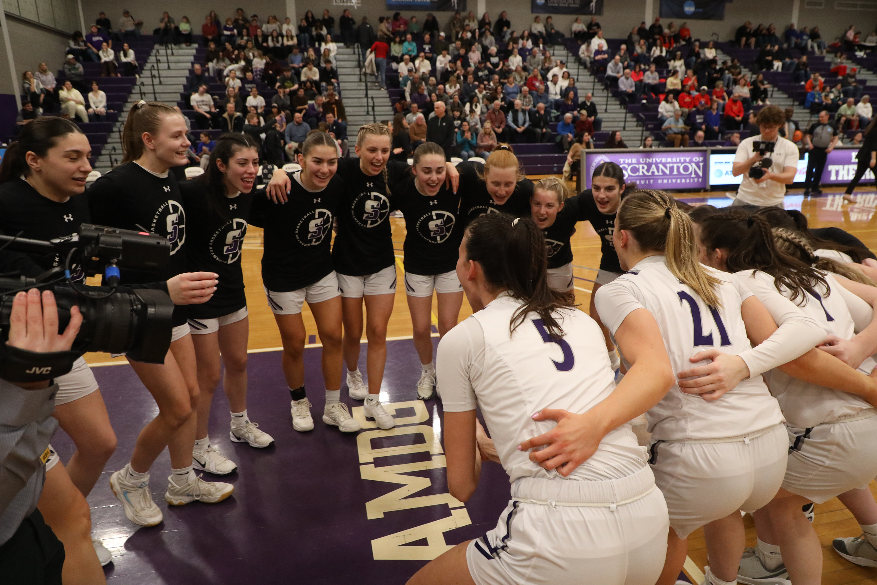 The Lady Royals rally together before the NCAA Division III...