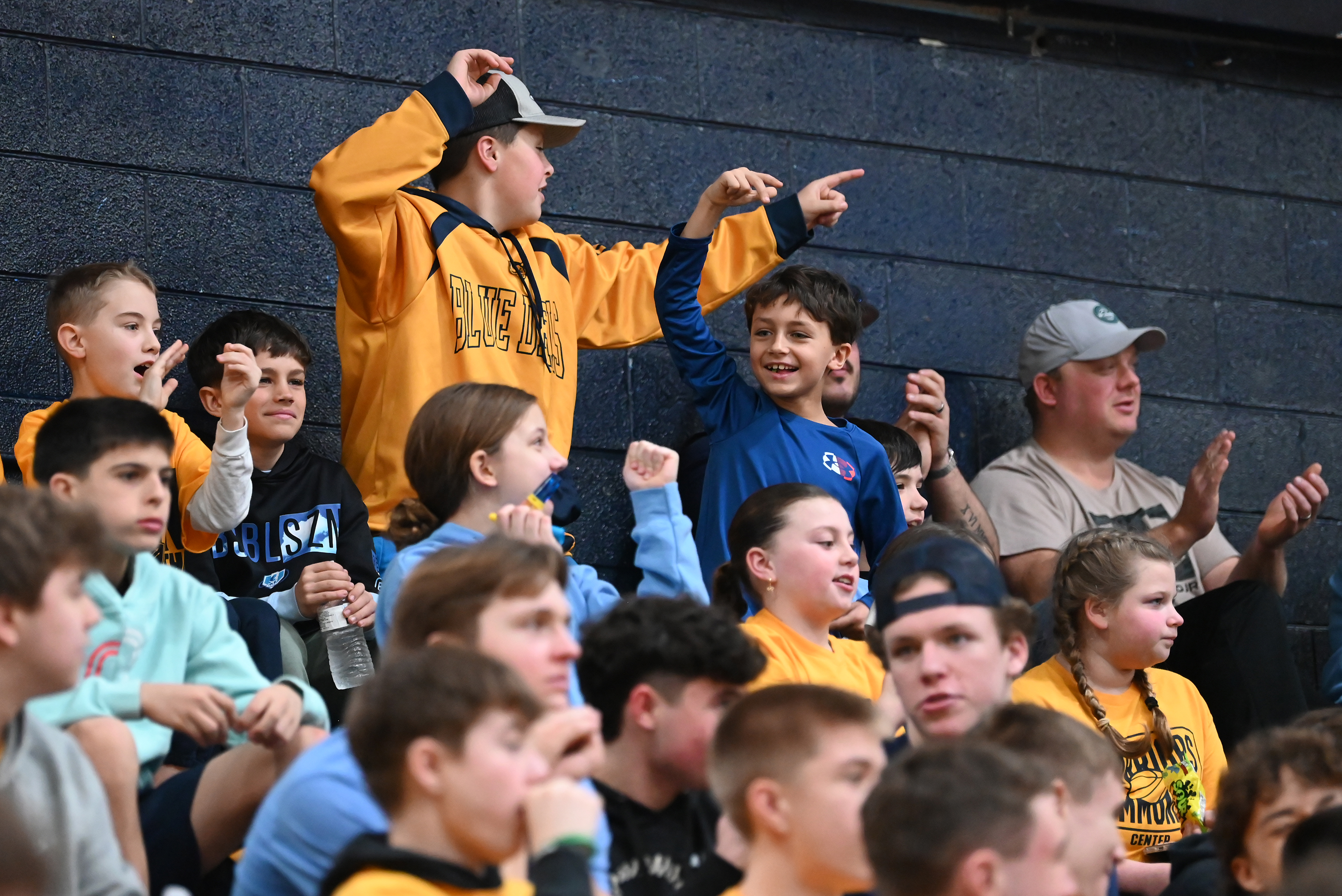 Old Forge fans cheer on their team during the PIAA...