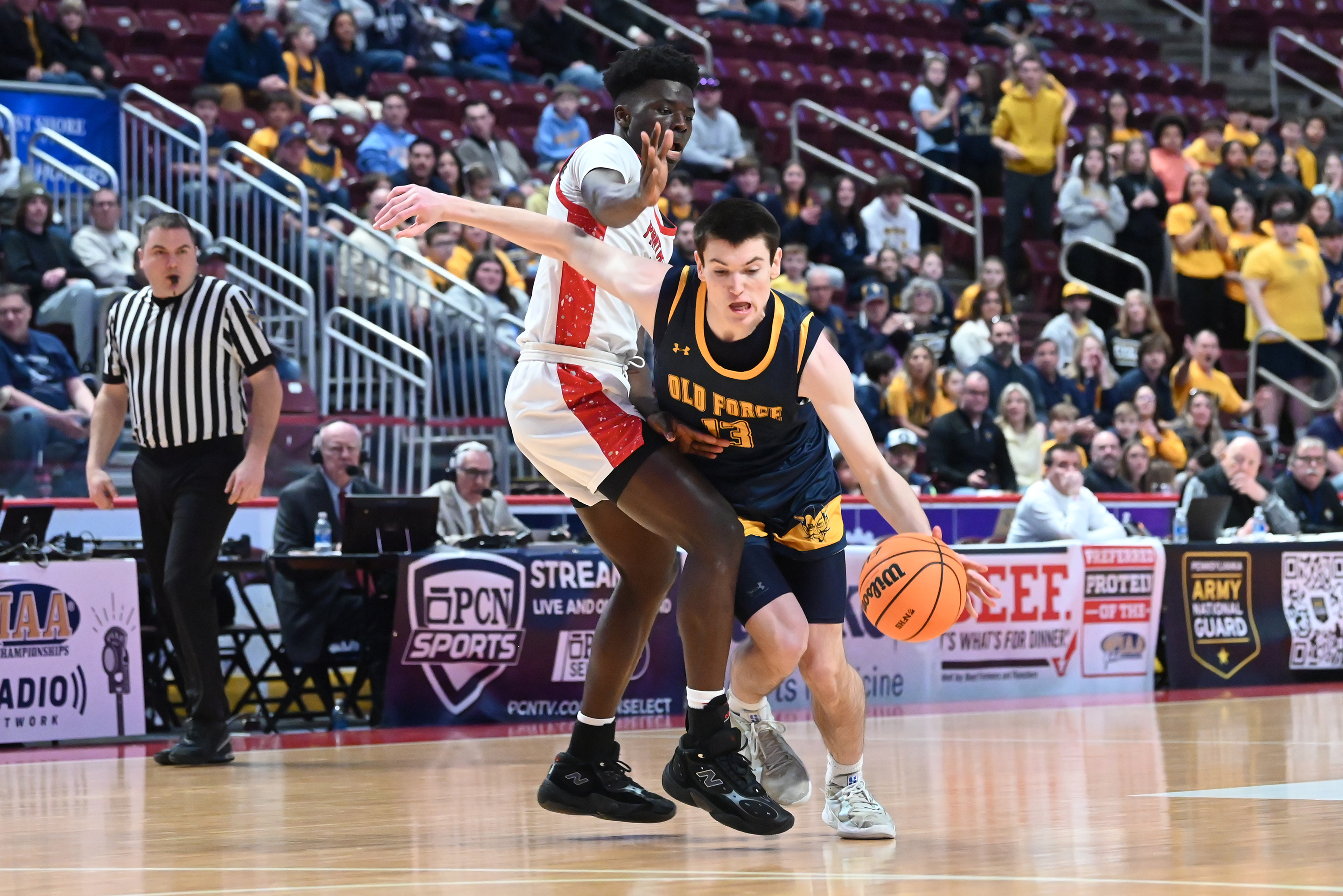 Sewickley Academy’s Mamadou Kate defends Old Forge’s Logan Fanning during...