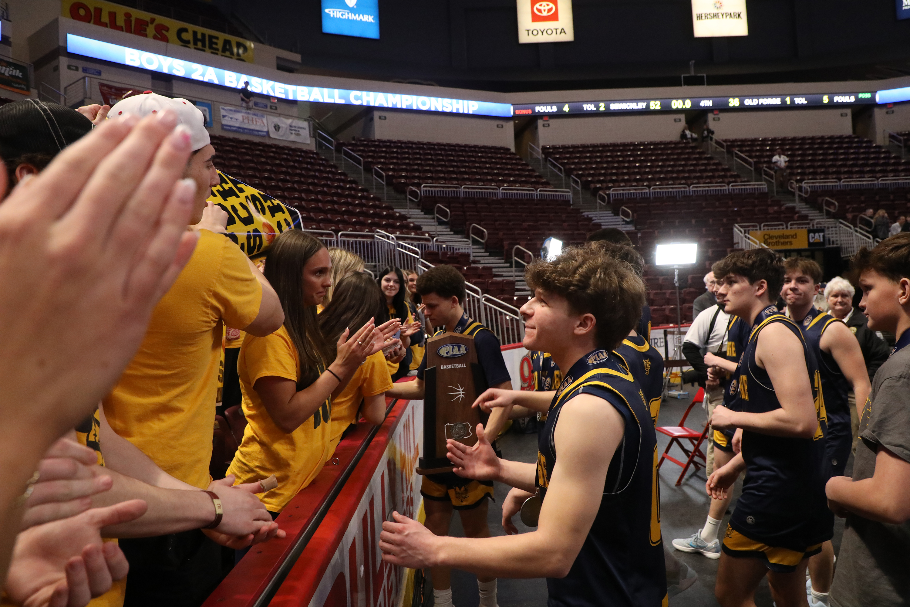 Old Forge players greet their student section after the PIAA...