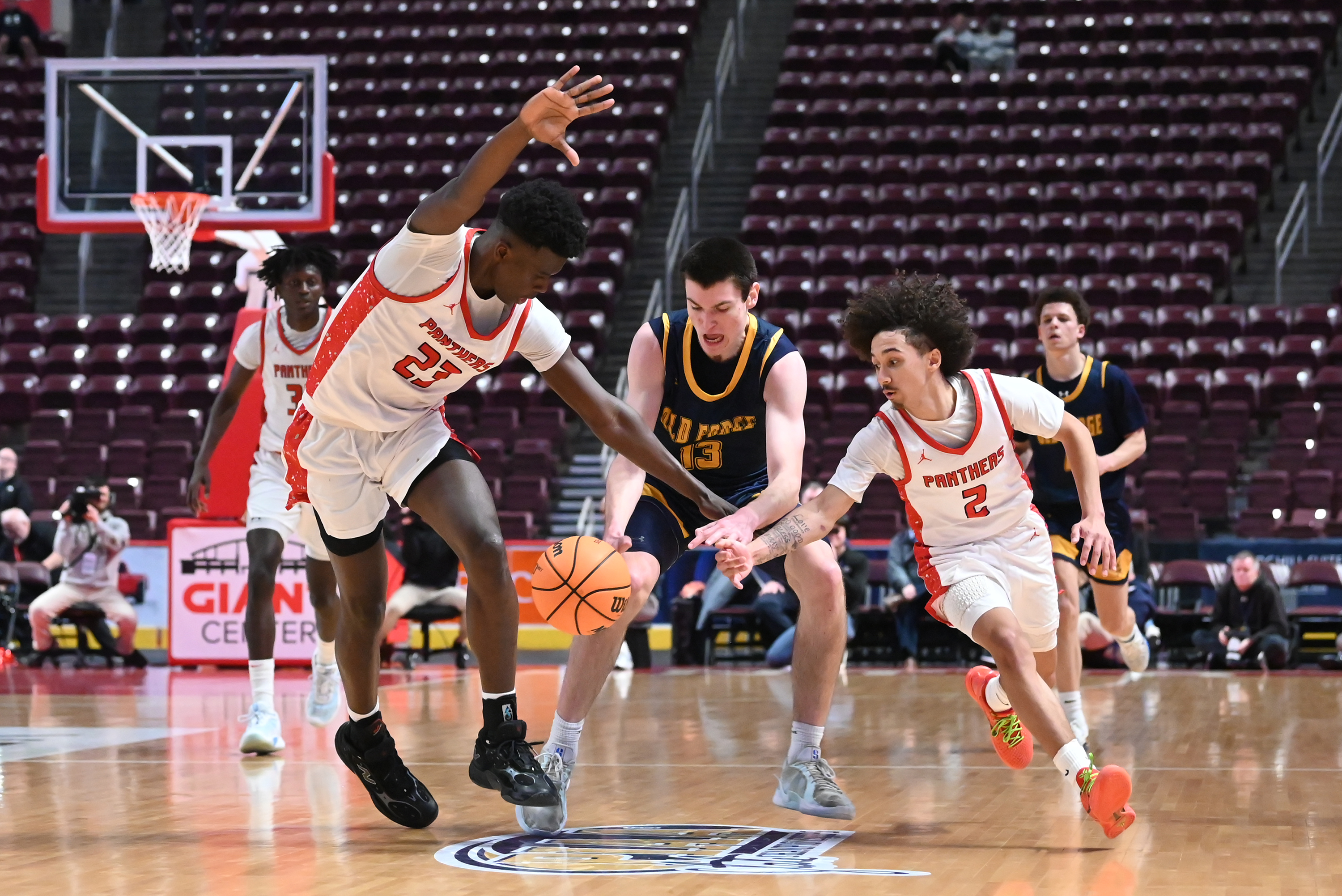 Sewickley Academy’s Mamadou Kate and Caden Battles work to get...