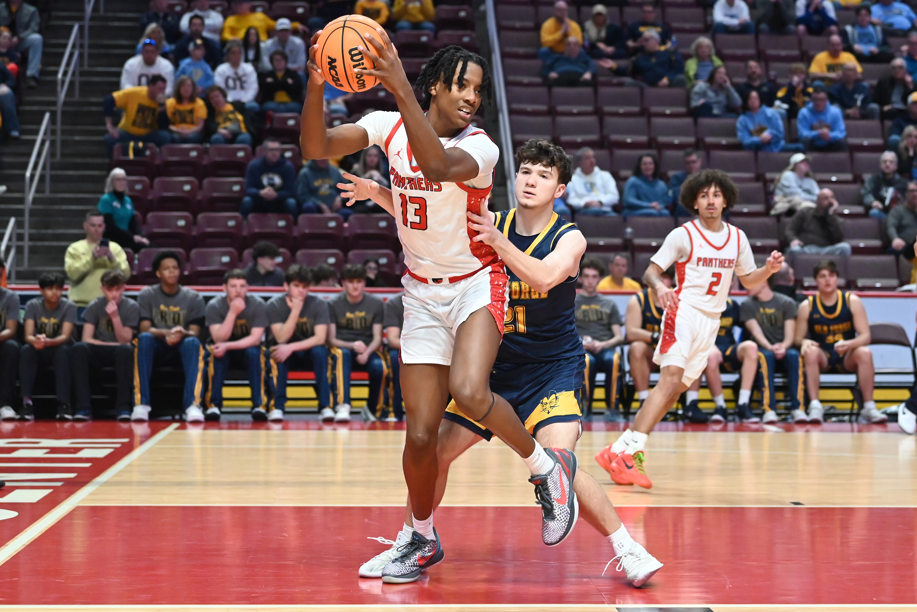 Old Forge’s Nick Salerno defends Sewickley Academy’s Ja’Mere Guyton during...
