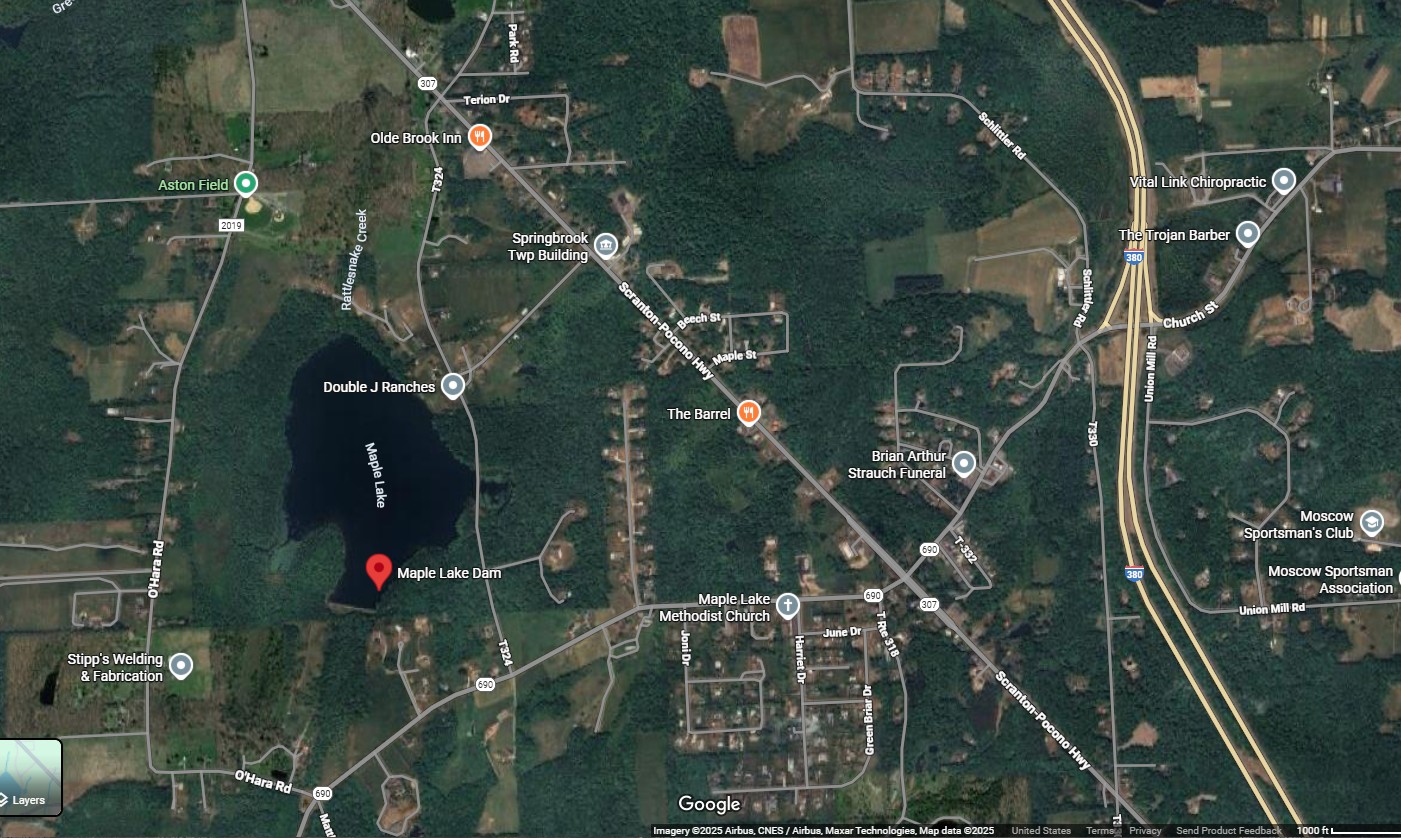 Maple Lake and its dam in Spring Brook Township, near...