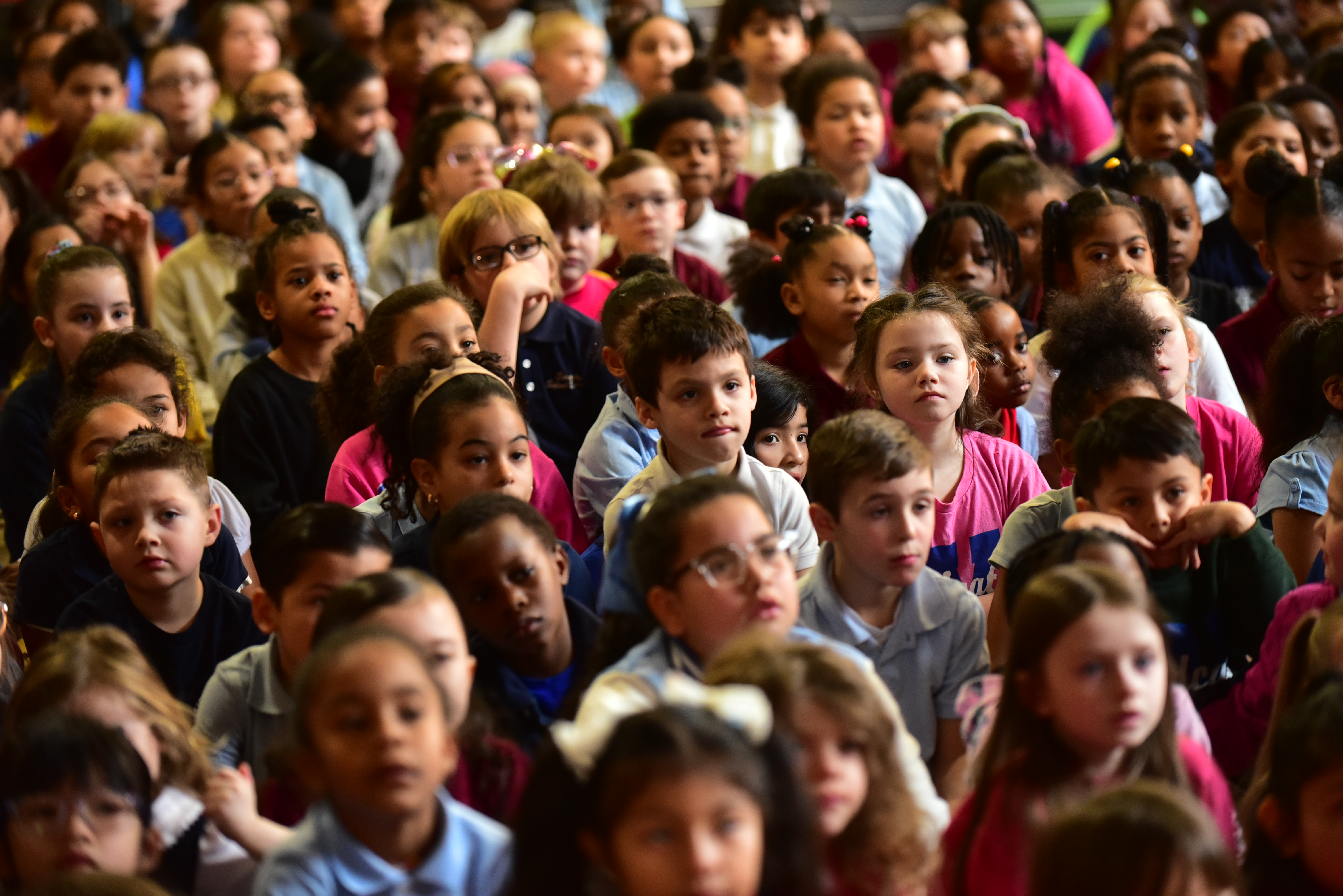 Frances Willard students listen at an event to announce a...