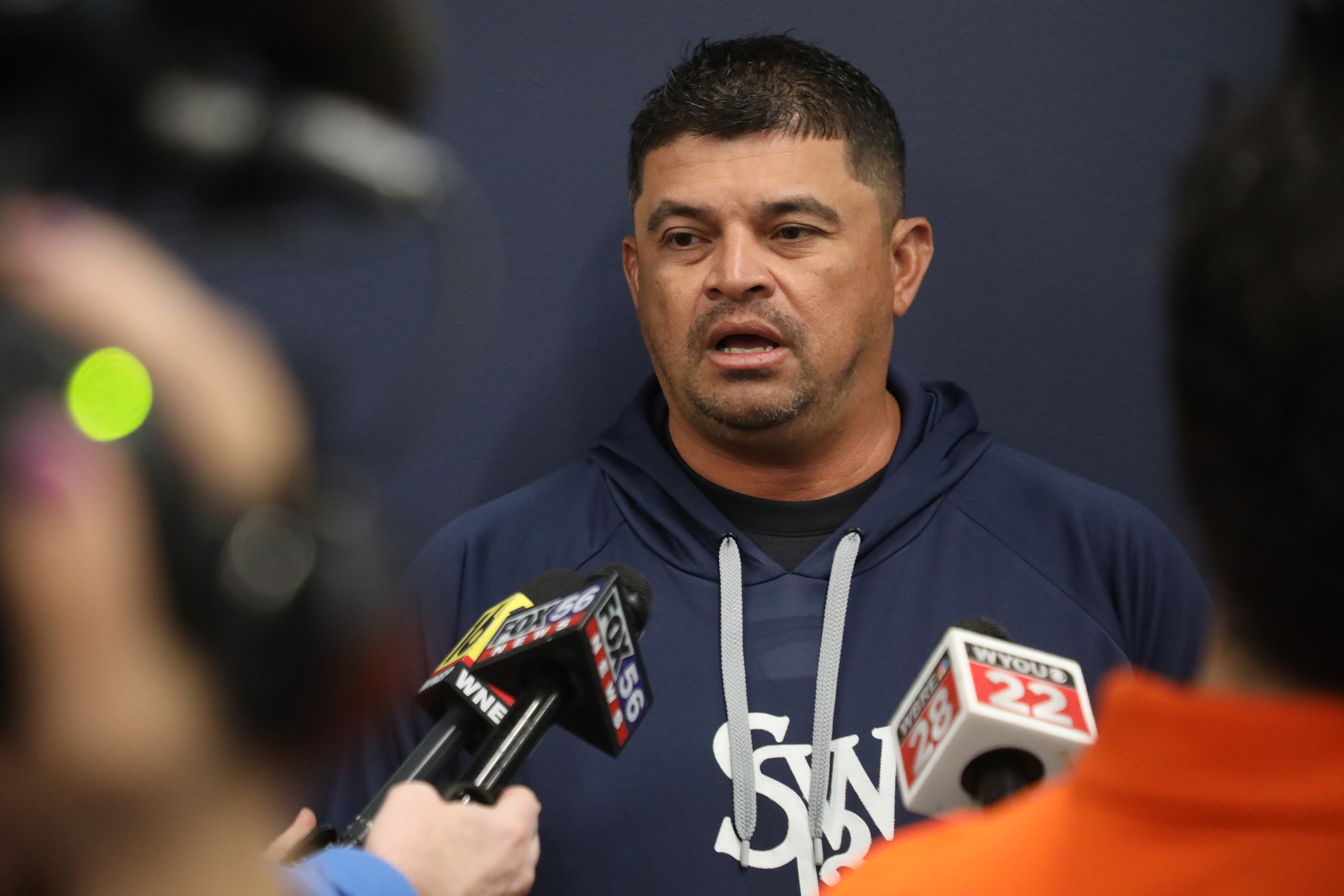 Bench Coach Raul Dominguez talks to the press during the...