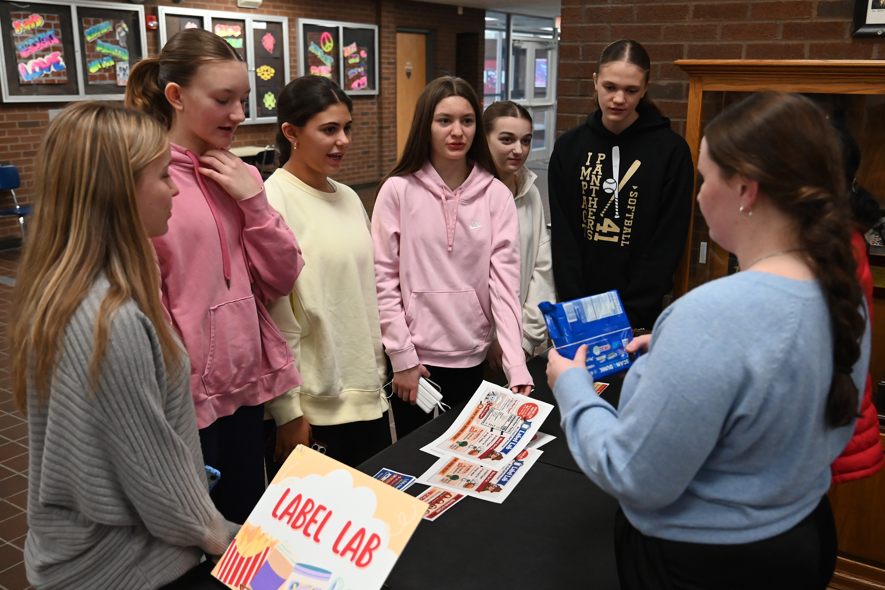 PA student McKenna Zohn, right, analyzes food labels with 8th...