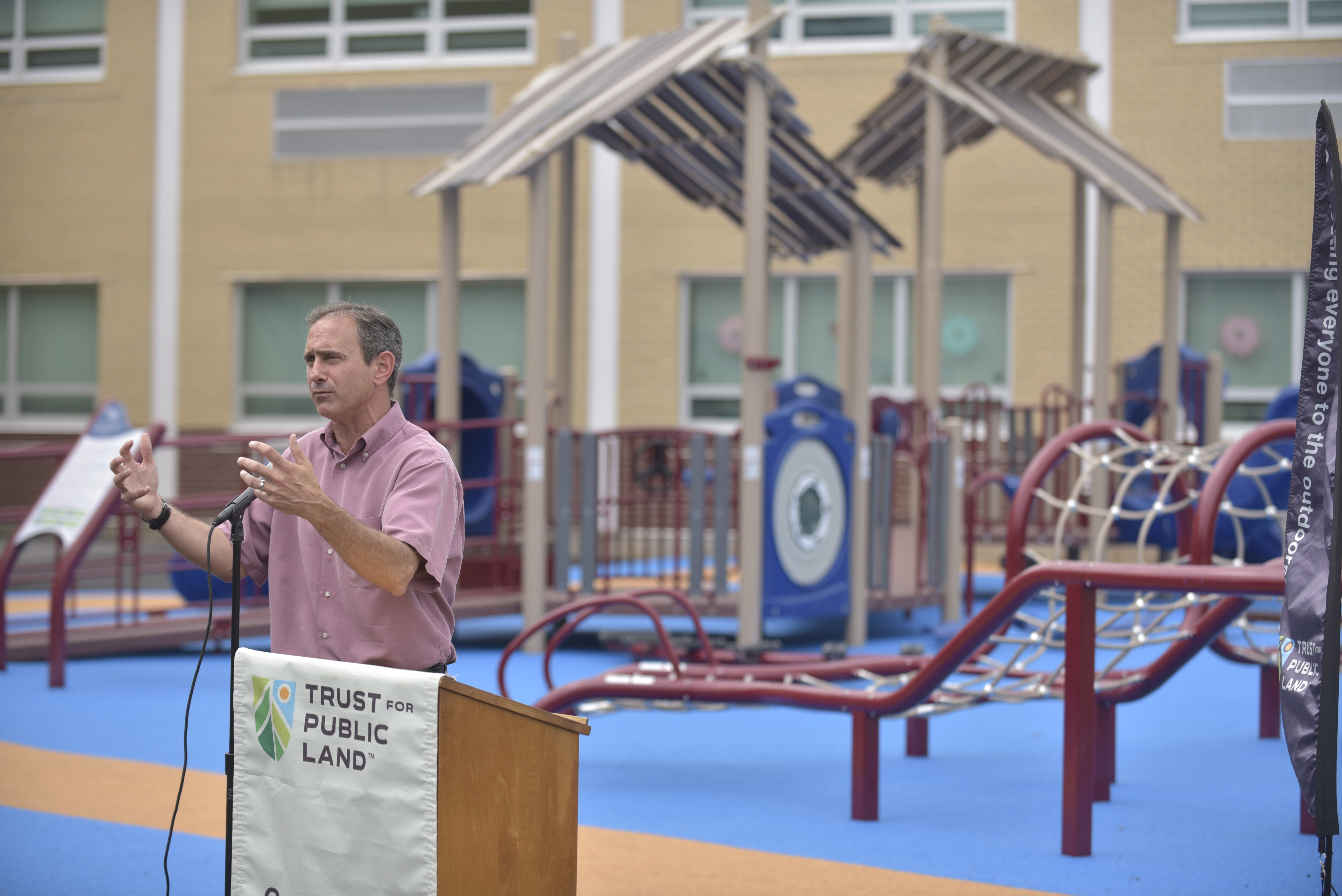 Gus Fahey, president of Valley in Motion, makes remarks at...