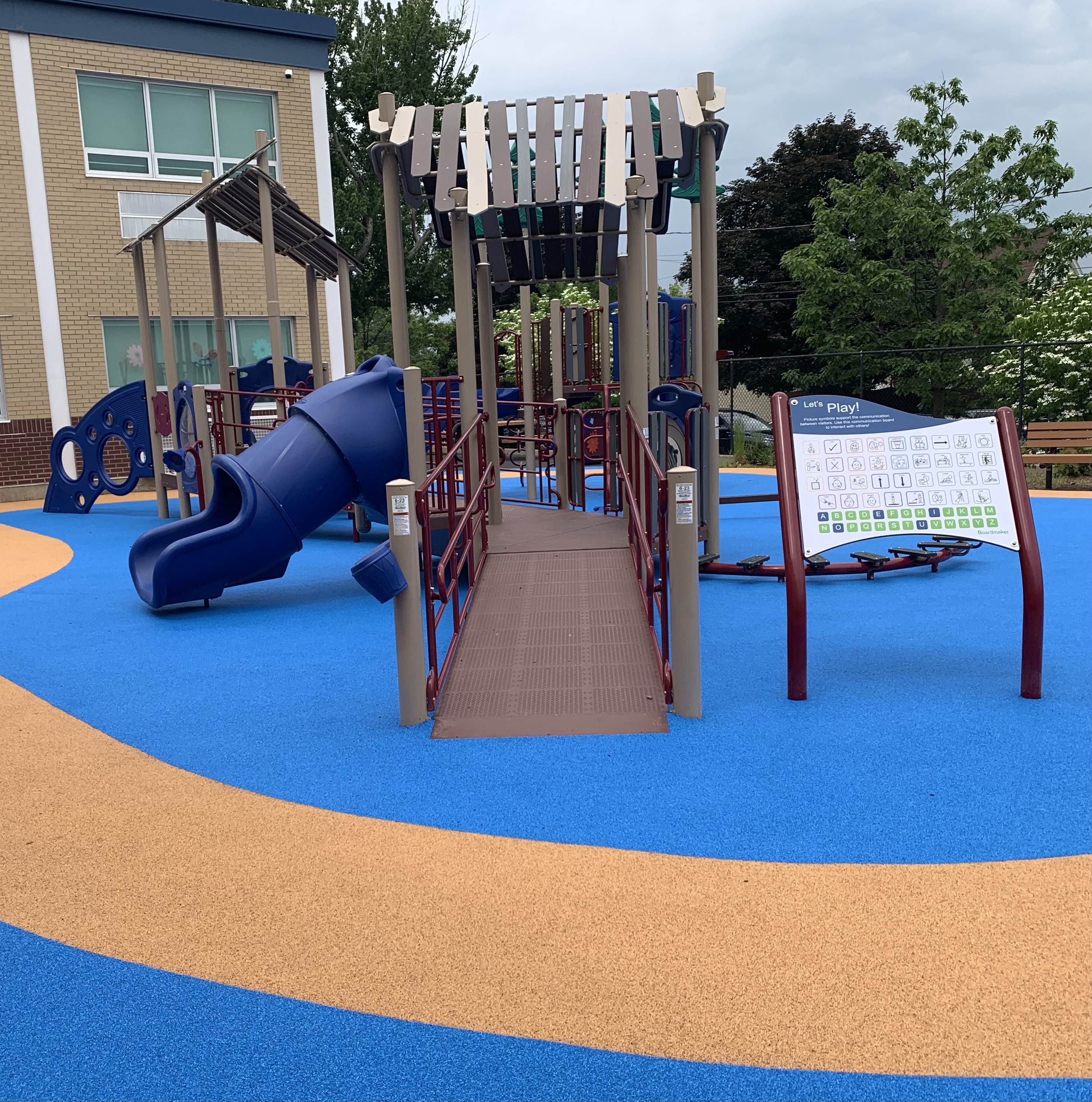 The new community schoolyard playground at John F. Kennedy Elementary...
