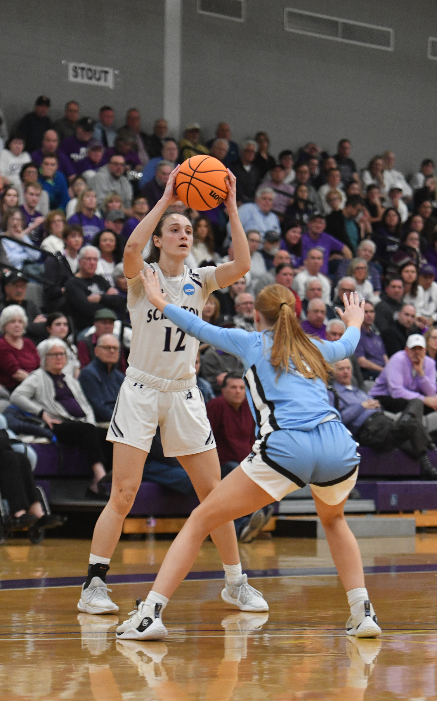 Scranton’s Jenna Sloan (12) is covered by Johns Hopkins’ Lauren...