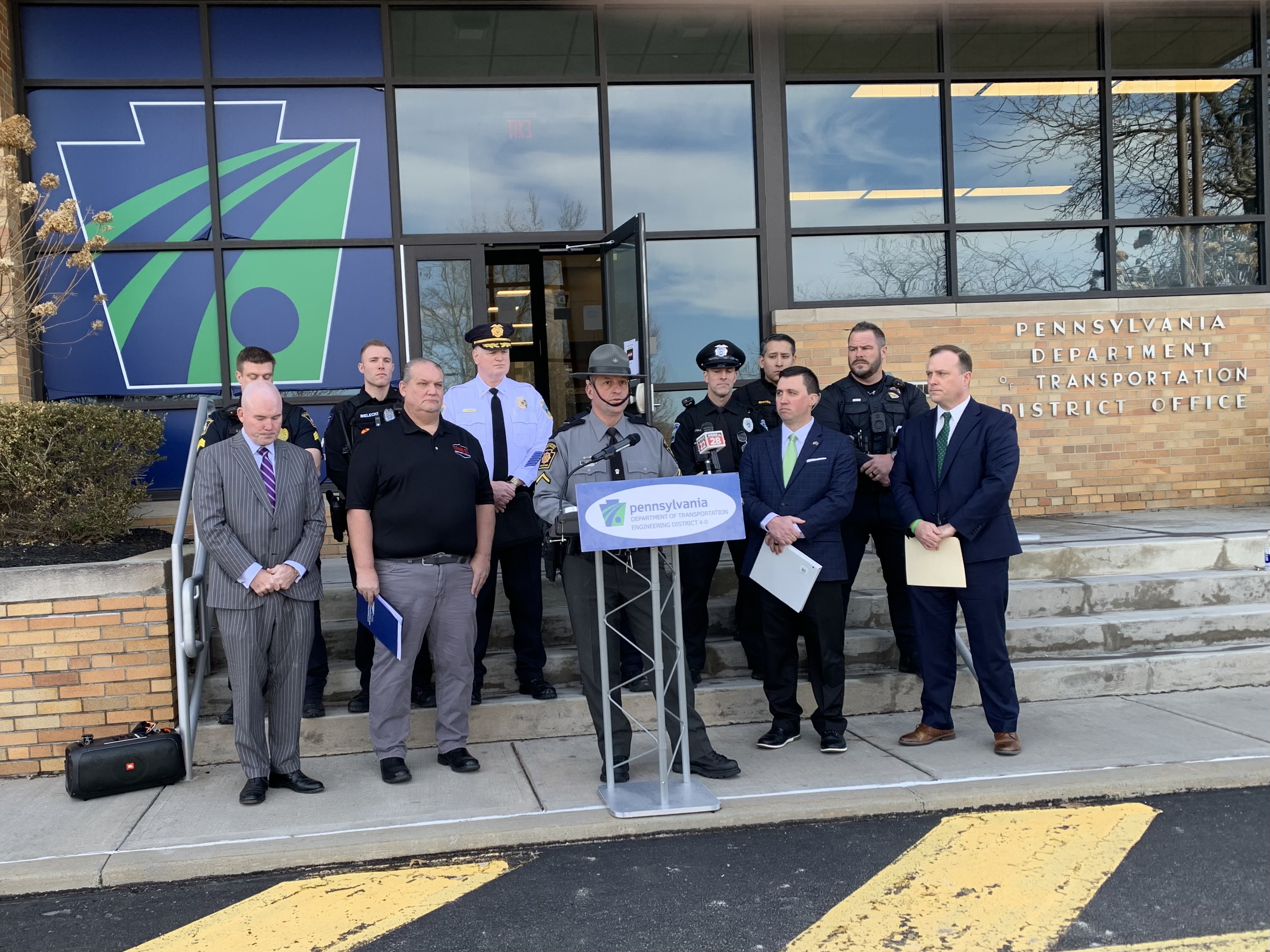 Pennsylvania State Police Trooper Bob Urban, at podium speaks on...