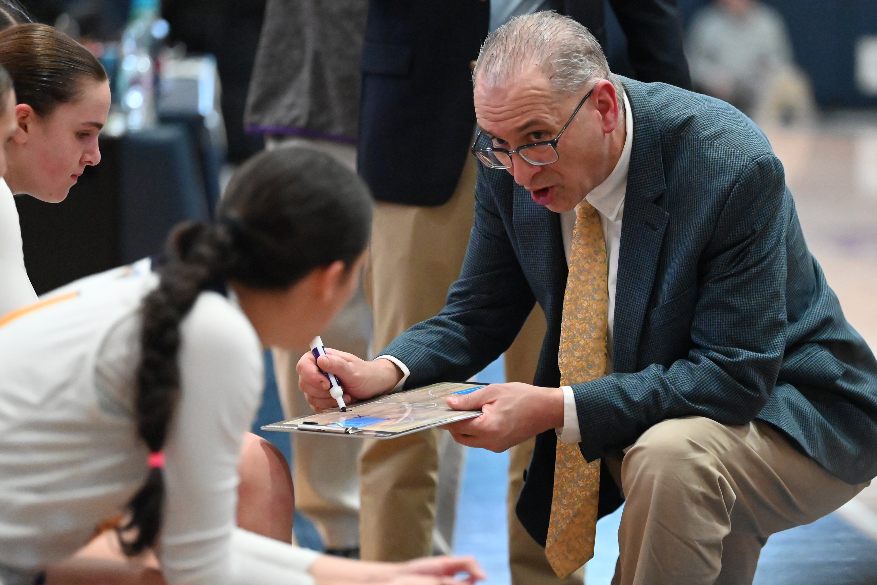 Scranton Prep’s Bob Beviglia talks to his players during the...