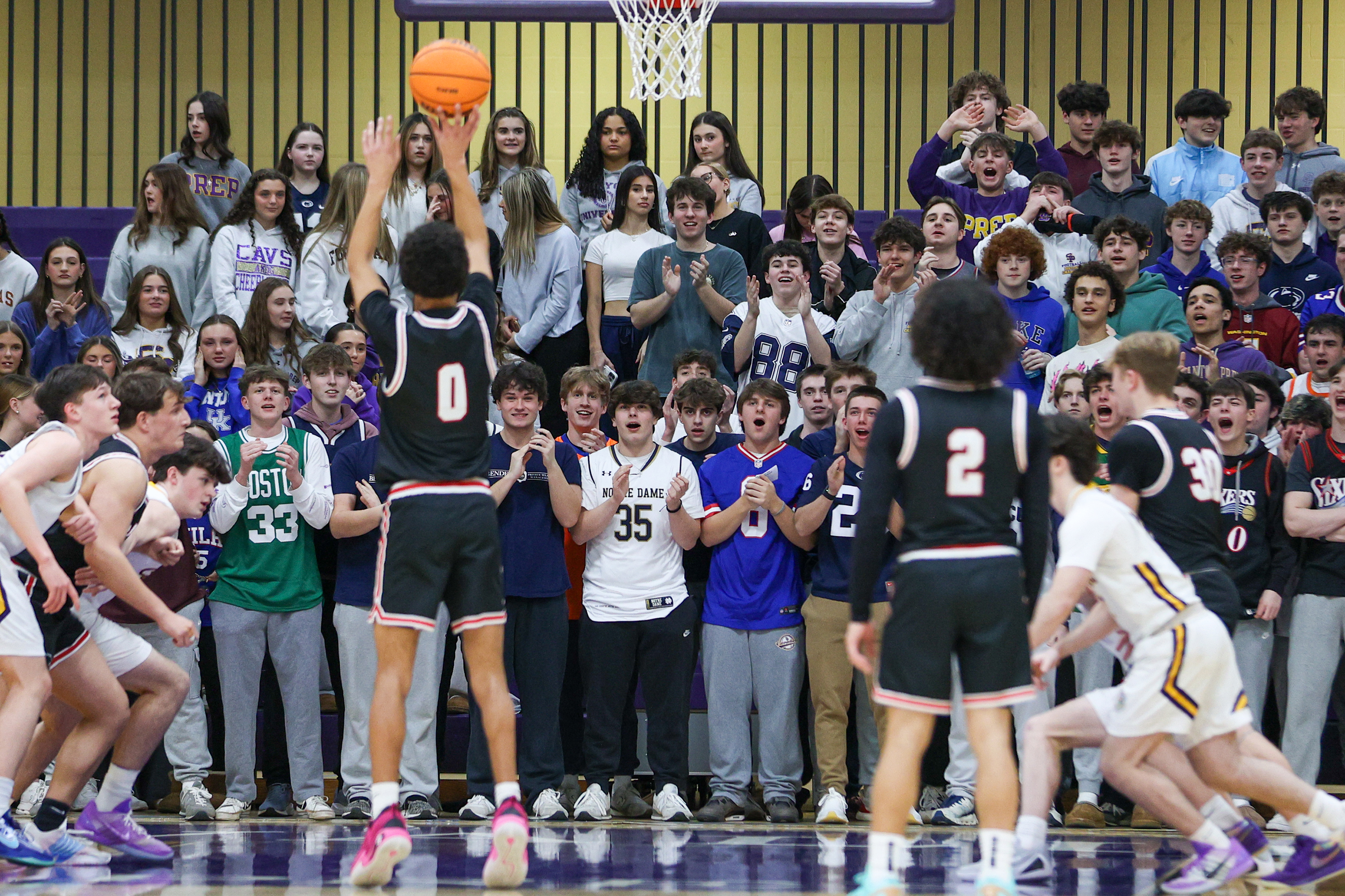 The Scranton Prep student section attempts to distract a Schuylkill...