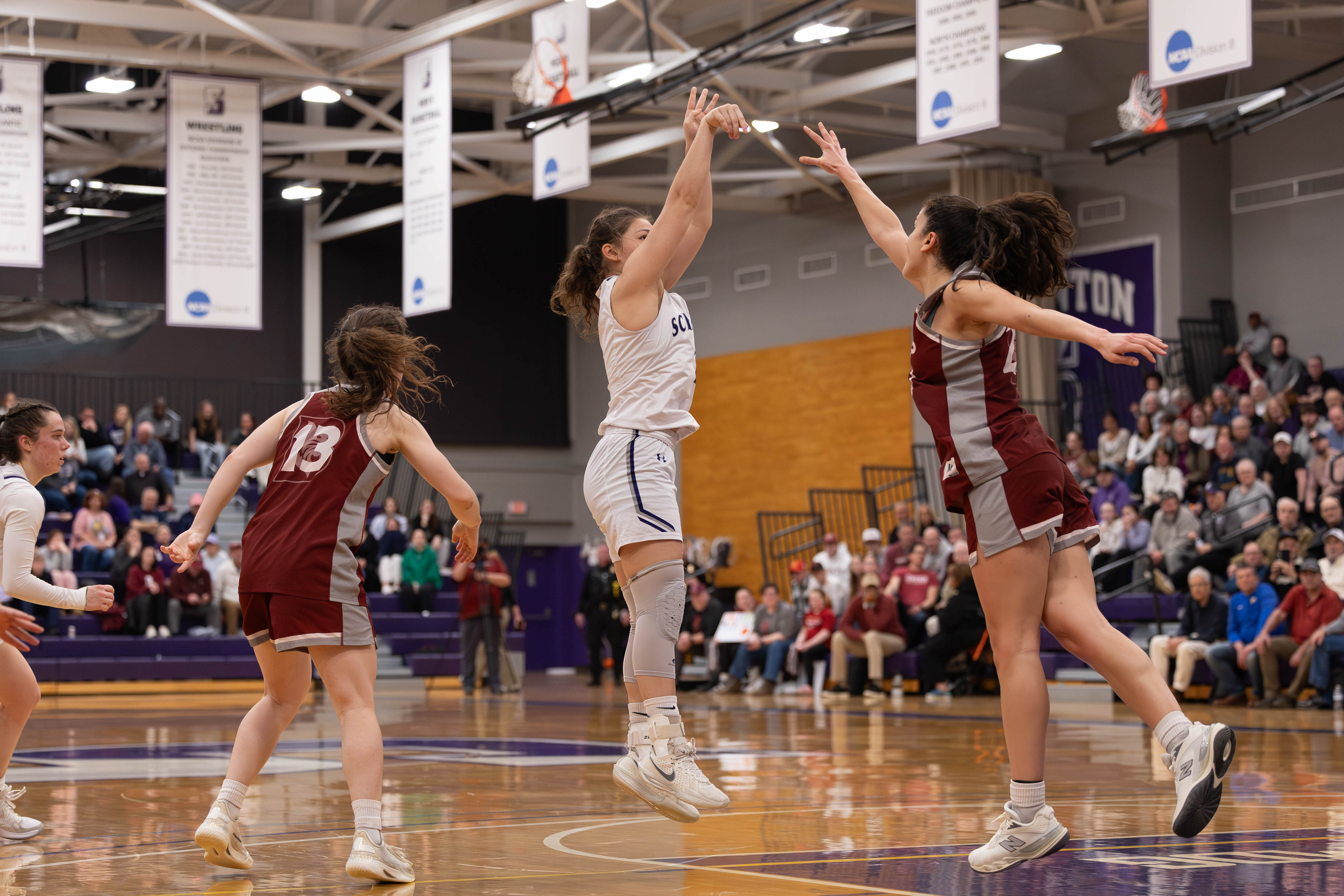 Sophia Talutto shoots a jumps shot against Bates College in...
