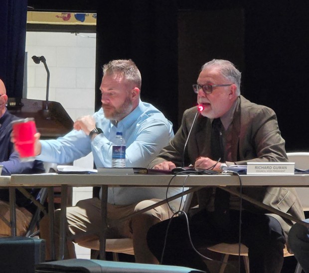 Councilman Louis Rapoch, right, speaks during a public hearing at the Valley View High School in Archbald on Tuesday, March 10, 2026. (FRANK WILKES LESNEFSKY / STAFF PHOTO)