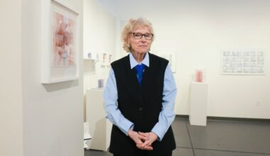 Diane Pepe, former University of the Arts professor, stands with her new work at Cerulean Arts Gallery. She had a show there for several weeks last month and in early March.