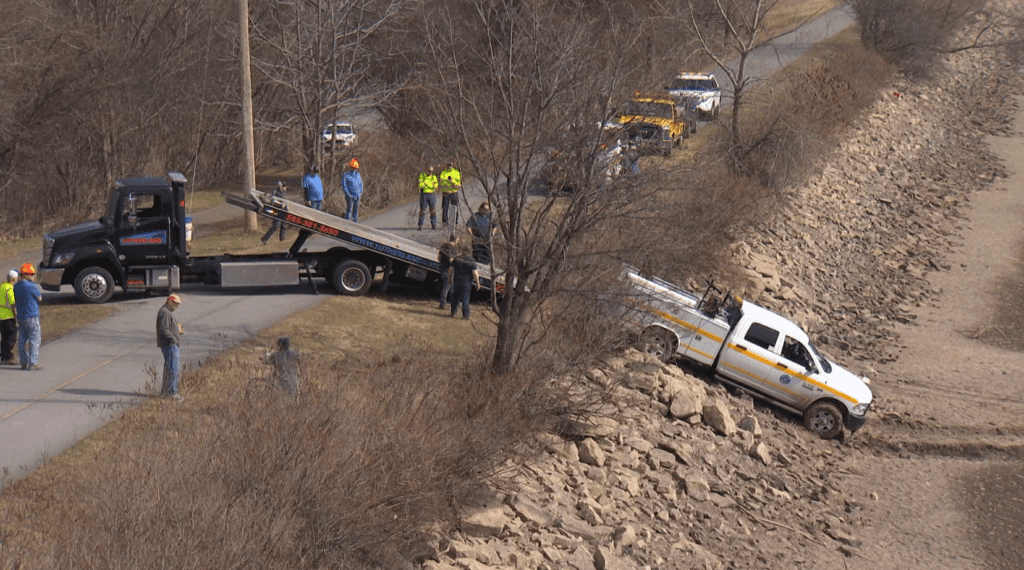 Crews seen pulling truck out of Erie Canal