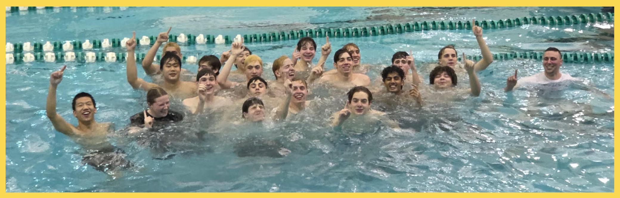 swim team celebrates in pool