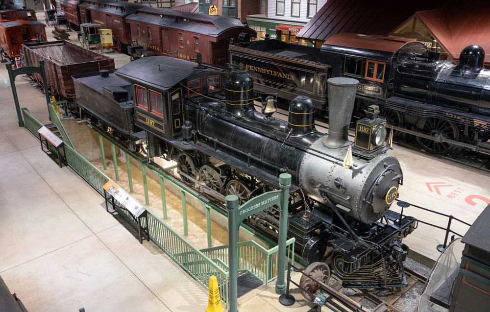 Old black and gray steam locomotive in museum. Solomon to lead Railroad Museum of Pennsylvania photo session.