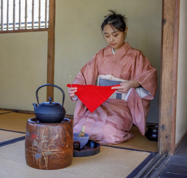 Tea Master Chu Chu, finishes a tea ceremony during the Bethlehem-Tondabayashi Sister City Commission's annual Cherry Blossom Festival on Saturday, March 28, 2026, at the Garden of Serenity in Bethlehem. The festival featured Japanese music, food, origami and tea ceremonies. (Jane Therese/Special to The Morning Call)