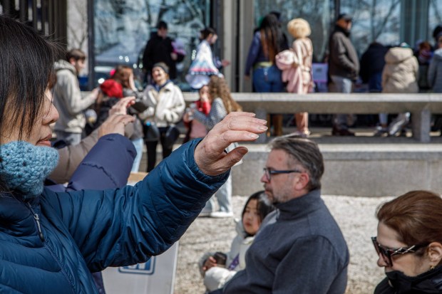 Chisako Fukushima of Lyons Station performs a healing ceremony during the Bethlehem-Tondabayashi Sister City Commission's annual Cherry Blossom Festival on Saturday, March 28, 2026, at the Garden of Serenity in Bethlehem. The festival featured Japanese music, food, origami and tea ceremonies. (Jane Therese/Special to The Morning Call)
