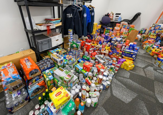 Donated items fill a room during a Fill the Bus donation drive Thursday, March 19, 2026, at Lehigh Valley International Airport. More than 20 carts were filled with donated paper products; toiletries, diapers and other baby products; gift cards; and nonperishable foods and beverages for TSA and Federal Aviation Administration workers at the airport who aren't being paid during the partial federal government shutdown. (April Gamiz/The Morning Call)
