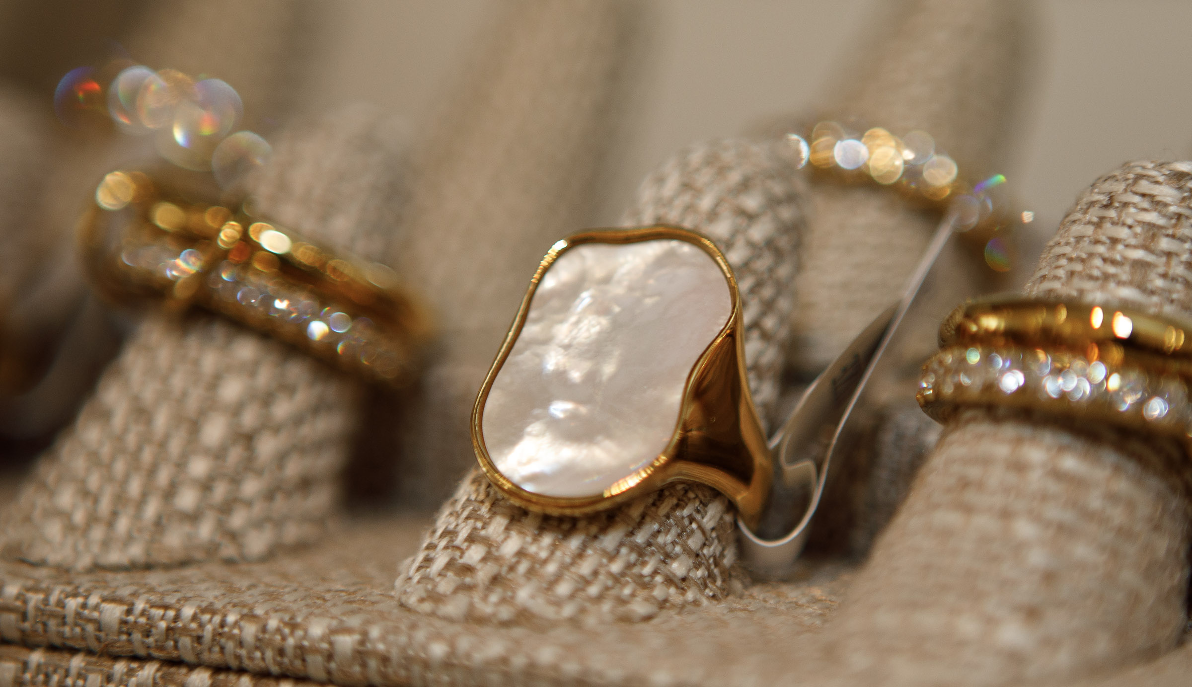 Mother of Pearl ring on display at Indulge Designer Resale...