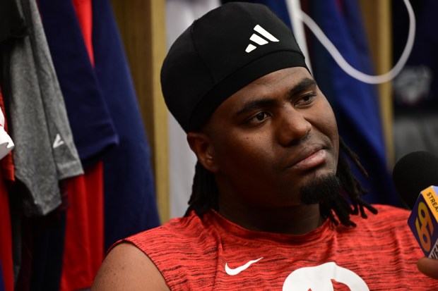 Lehigh Valley IronPigs Felix Reyes sits Wednesday, March 25, 2026, at his locker inside the IronPigs clubhouse during media day at Coca-Cola park in Allentown. (Monica Cabrera/The Morning Call)