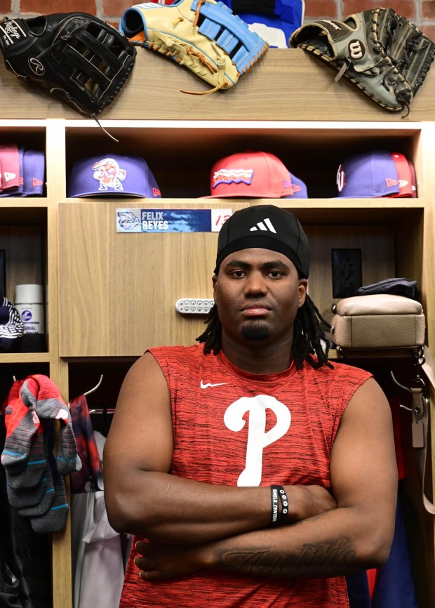 Lehigh Valley IronPigs Felix Reyes sits Wednesday, March 25, 2026, at his locker inside the IronPigs clubhouse during media day at Coca-Cola park in Allentown. (Monica Cabrera/The Morning Call)