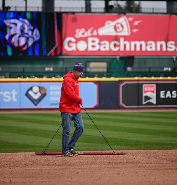A worker smooths the infield baseline with a drag mat Wednesday, March 25, 2026, during media day at Coca-Cola park in Allentown. (Monica Cabrera/The Morning Call)