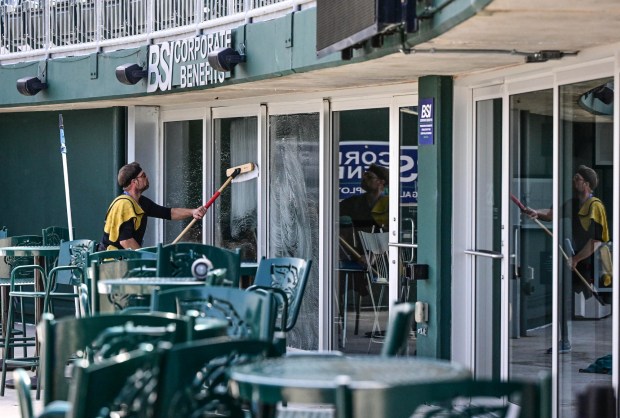 The BSI Dugout Suites get a window washing Wednesday, March 25, 2026, during media day at Coca-Cola park in Allentown. (Monica Cabrera/The Morning Call)