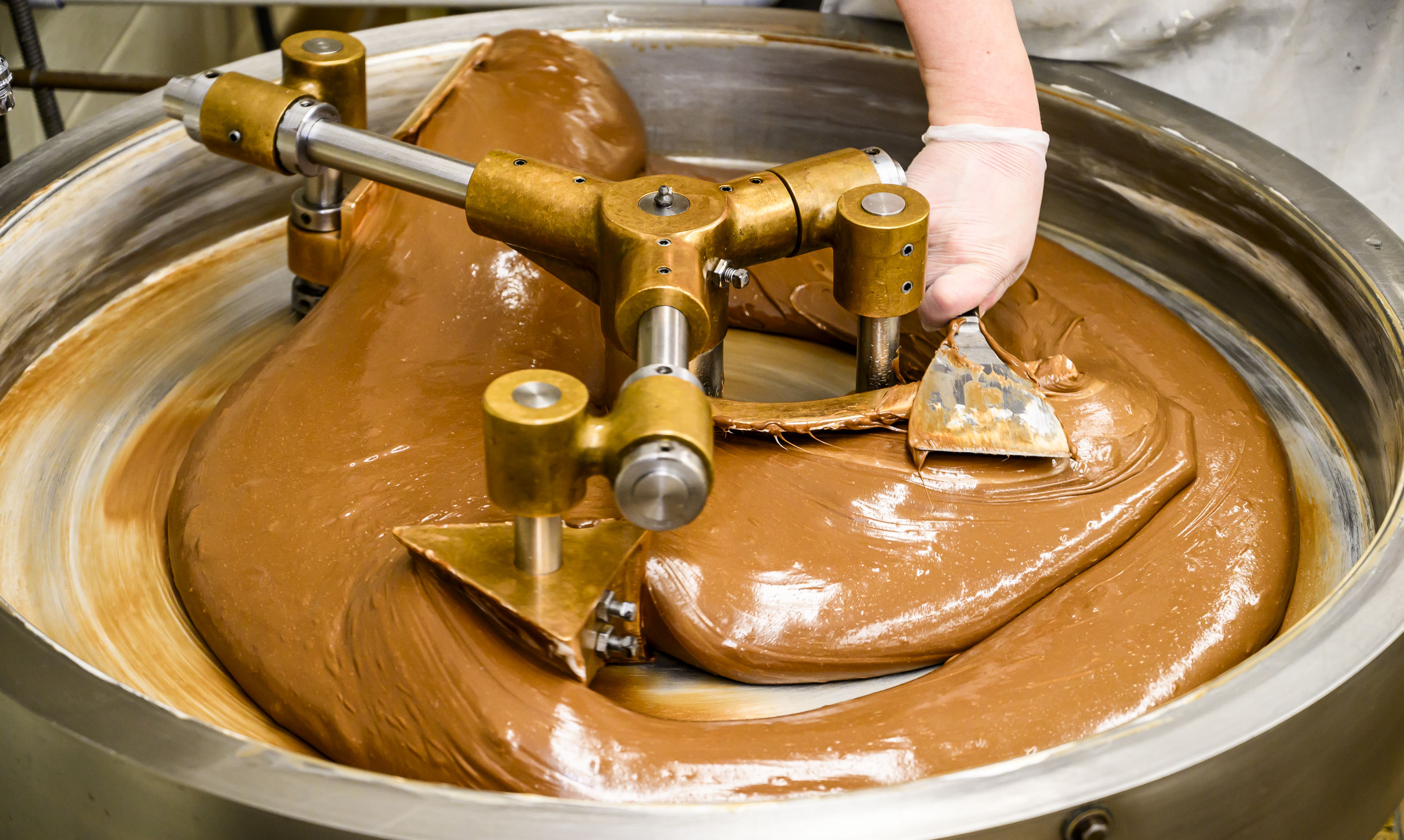 Tony Rothrock makes chocolate buttercream Tuesday, March 10, 2026, at...