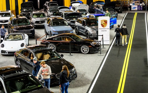 People look at luxury vehicles Wednesday, March 18, 2026, during Lehigh Valley Auto Show 2026 at Lehigh University's Goodman Campus in Bethlehem. The show features more than 400 vehicles from 66 different brands and runs Thursday-Saturday: 10 a.m.- 8 p.m.; Sunday: 10 a.m.-5 p.m. (April Gamiz/The Morning Call)