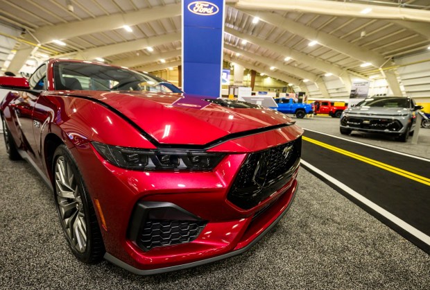 A Ford Mustang in Molten Magenta Metallic color is on display Wednesday, March 18, 2026, during Lehigh Valley Auto Show 2026 at Lehigh University's Goodman Campus in Bethlehem. The show features more than 400 vehicles from 66 different brands and runs Thursday-Saturday: 10 a.m.- 8 p.m.; Sunday: 10 a.m.-5 p.m. (April Gamiz/The Morning Call)
