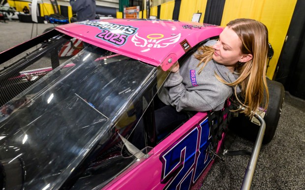 Driver Makayla Kohler of Schnecksville demonstrates how she enters and buckles into her Crate 602 Modified race car on Wednesday, March 18, 2026, during Lehigh Valley Auto Show 2026 at Lehigh University's Goodman Campus in Bethlehem. The show features more than 400 vehicles from 66 different brands and runs Thursday-Saturday: 10 a.m.- 8 p.m.; Sunday: 10 a.m.-5 p.m. (April Gamiz/The Morning Call)