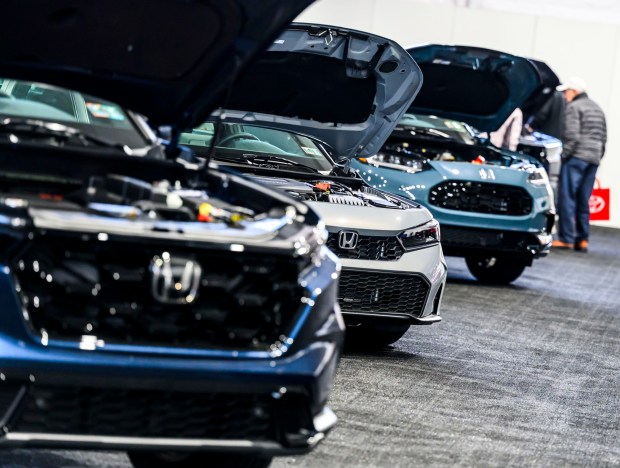 Ms. Motorama 2026 Madison Deal of Hummelstown checks out a Ford Bronco Wednesday, March 18, 2026, during Lehigh Valley Auto Show 2026 at Lehigh University's Goodman Campus in Bethlehem. The show features more than 400 vehicles from 66 different brands and runs Thursday-Saturday: 10 a.m.- 8 p.m.; Sunday: 10 a.m.-5 p.m. (April Gamiz/The Morning Call)