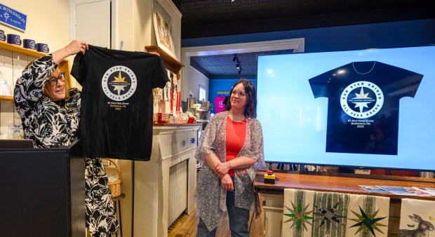 Kelly Ronalds, general manager of the Historic Hotel Bethlehem, speaks as Brianna Lasko of Lovely by Brianna, watches Monday, March 9, 2026, during a news conference at Schropp Dry Goods Shoppe in Bethlehem unveiling that Main Street in Bethlehem was nominated in USA Today's 10Best Main Street competition for 2026. It won in 2025 in an effort led by the hotel's marketing team. The news conference also introduced the Our Star Shines All Year Round marketing campaign to encourage travelers to visit the city. (April Gamiz/The Morning Call)