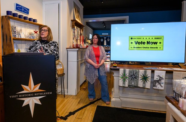 Kelly Ronalds, general manager of the Historic Hotel Bethlehem, speaks as Brianna Lasko of Lovely by Brianna, watches Monday, March 9, 2026, during a news conference at Schropp Dry Goods Shoppe in Bethlehem unveiling that Main Street in Bethlehem was nominated in USA Today's 10Best Main Street competition for 2026. It won in 2025 in an effort led by the hotel's marketing team. The news conference also introduced the Our Star Shines All Year Round marketing campaign to encourage travelers to visit the city. (April Gamiz/The Morning Call)