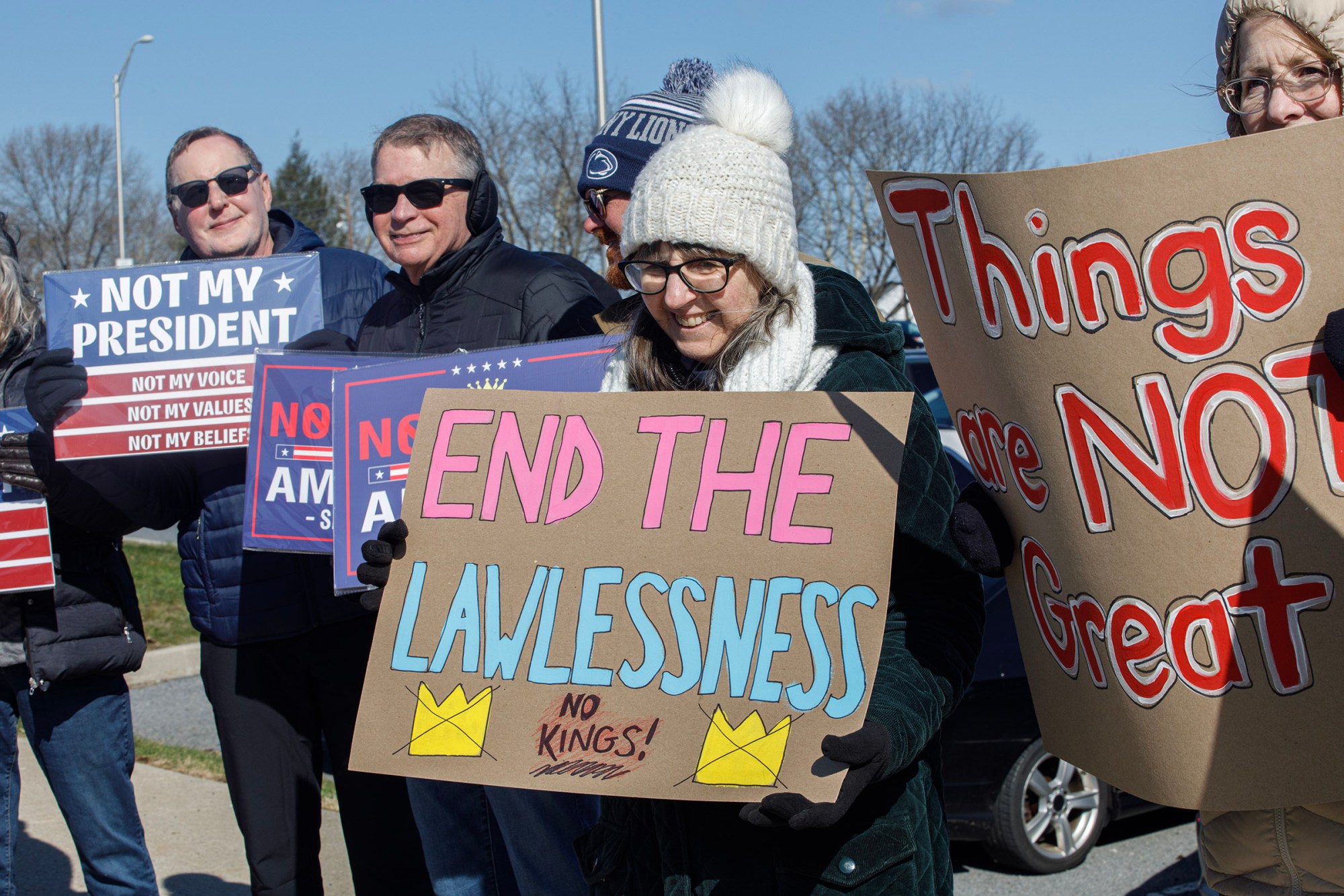 People protest as part of the No Kings protest at Emrick Boulevard and William Penn Highway on Saturday, March 28, 2026, in Bethlehem Township. Lehigh Valley activists said they hoped Saturday's protests would become a tipping point in the anti-Trump movement, with thousands expected to participate in events locally and millions nationwide. (Jane Therese/Special to The Morning Call)