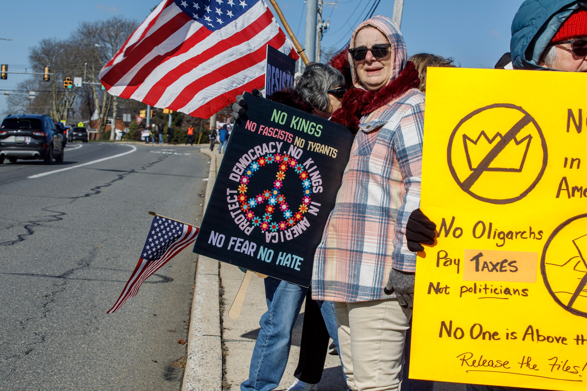 People protest as part of the No Kings protest at Emrick Boulevard and William Penn Highway on Saturday, March 28, 2026, in Bethlehem Township. Lehigh Valley activists said they hoped Saturday's protests would become a tipping point in the anti-Trump movement, with thousands expected to participate in events locally and millions nationwide. (Jane Therese/Special to The Morning Call)