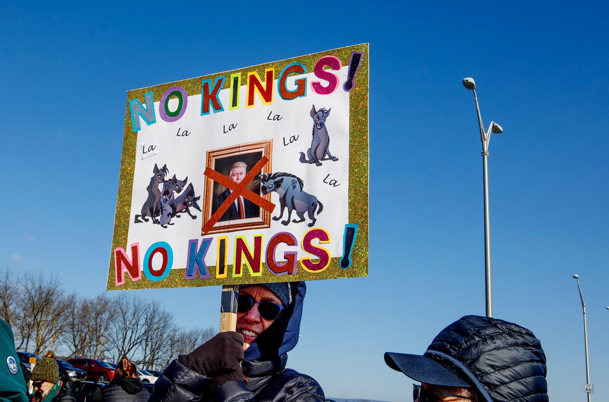 People protest as part of the No Kings protest at Emrick Boulevard and William Penn Highway on Saturday, March 28, 2026, in Bethlehem Township. Lehigh Valley activists said they hoped Saturday's protests would become a tipping point in the anti-Trump movement, with thousands expected to participate in events locally and millions nationwide. (Jane Therese/Special to The Morning Call)
