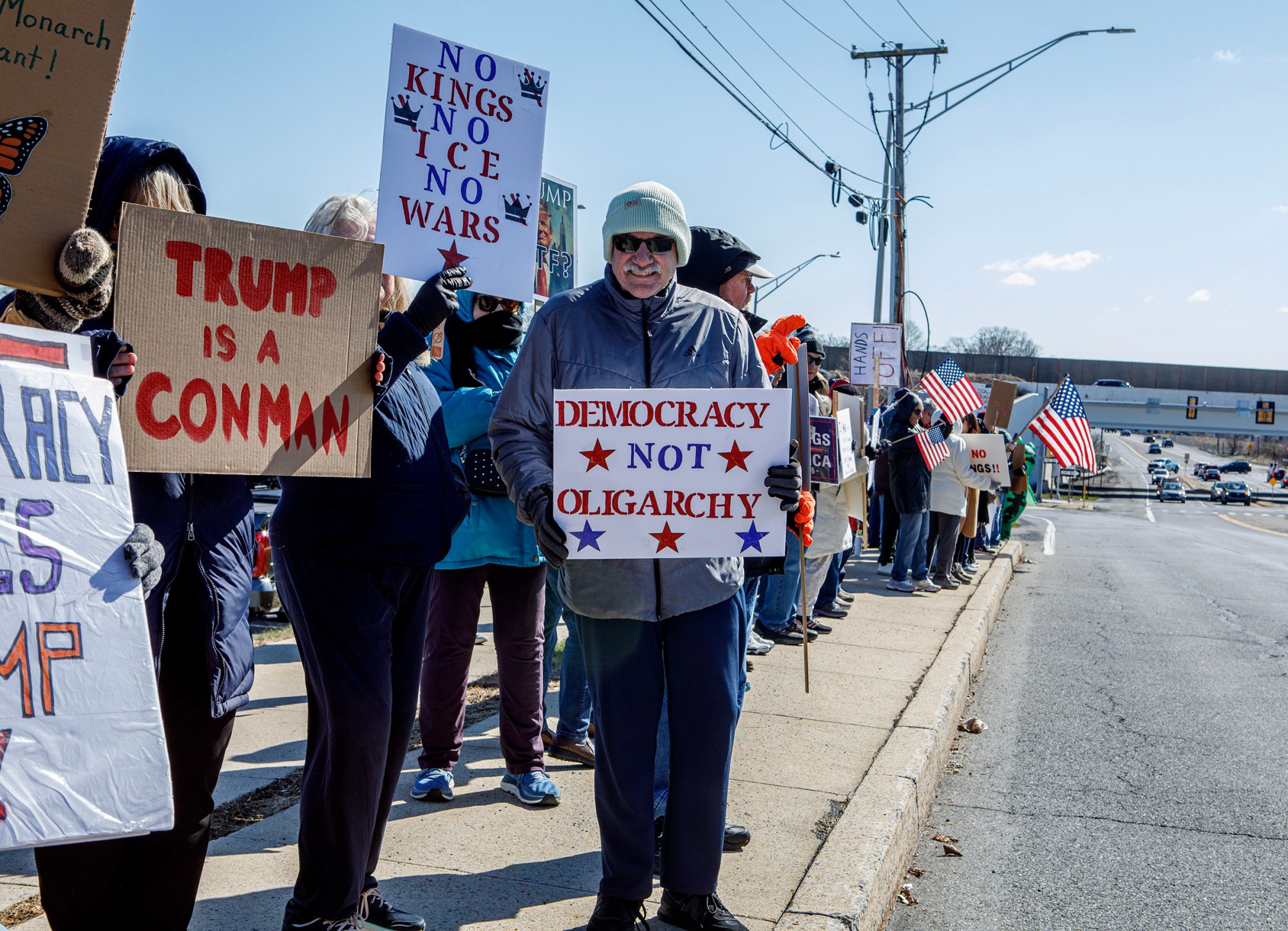 People protest as part of the No Kings protest at Emrick Boulevard and William Penn Highway on Saturday, March 28, 2026, in Bethlehem Township. Lehigh Valley activists said they hoped Saturday's protests would become a tipping point in the anti-Trump movement, with thousands expected to participate in events locally and millions nationwide. (Jane Therese/Special to The Morning Call)