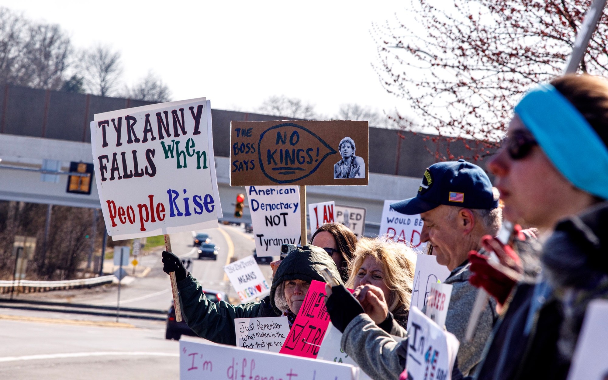 People protest as part of the No Kings protest at Emrick Boulevard and William Penn Highway on Saturday, March 28, 2026, in Bethlehem Township. Lehigh Valley activists said they hoped Saturday's protests would become a tipping point in the anti-Trump movement, with thousands expected to participate in events locally and millions nationwide. (Jane Therese/Special to The Morning Call)
