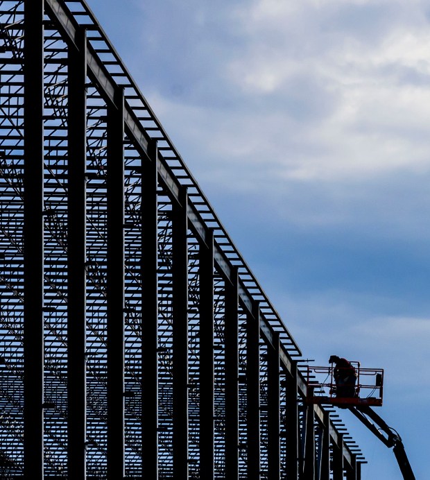 Construction continues on an industrial building Monday, March 2, 2026, at a 26-acre lot at 2141 Commerce Center Blvd., in Bethlehem. The project is being developed by JERC Partners XCII LLC, a J.G. Petrucci Co. entity, and Lehigh Valley Industrial Park. (April Gamiz/The Morning Call)