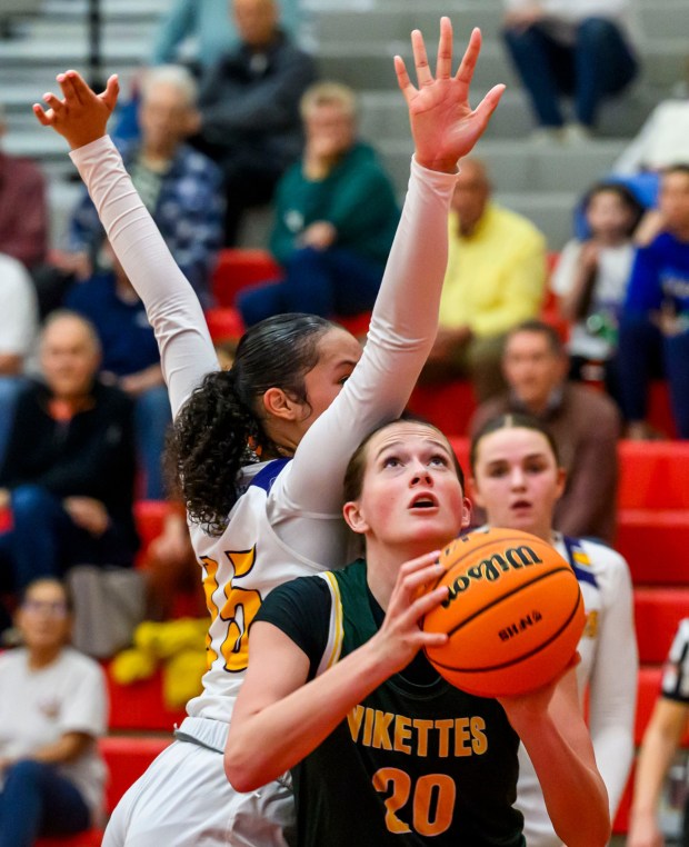 Allentown Central Catholic's Morgan Seagreaves looks to score against Scranton Prep's Kamyl Lynady on Wednesday, March 11, 2026, during a 4A second-round girls basketball game at Hazleton Area High School. (April Gamiz/The Morning Call)