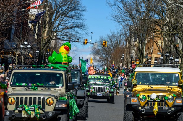 Jeep Enthusiasts of Easton Pa and other Jeeps drive Saturday, March 14, 2026, during the 16th annual Parade of Shamrocks in downtown Bethlehem. The parade was presented by the Celtic Cultural Alliance and Historic Hotel Bethlehem. The St. Patrick's Day celebration featured pipe bands, school marching bands and community groups, starting on Broad Street and ending under the Hill-To-Hill Bridge. (April Gamiz/The Morning Call)
