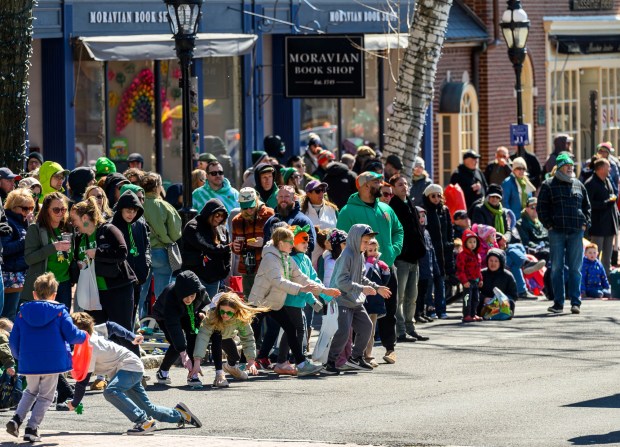 People of all ages enjoy the sights and sounds Saturday, March 14, 2026, during the 16th annual Parade of Shamrocks in downtown Bethlehem. The parade was presented by the Celtic Cultural Alliance and Historic Hotel Bethlehem. The St. Patrick's Day celebration featured pipe bands, school marching bands and community groups, starting on Broad Street and ending under the Hill-To-Hill Bridge.(April Gamiz/The Morning Call)