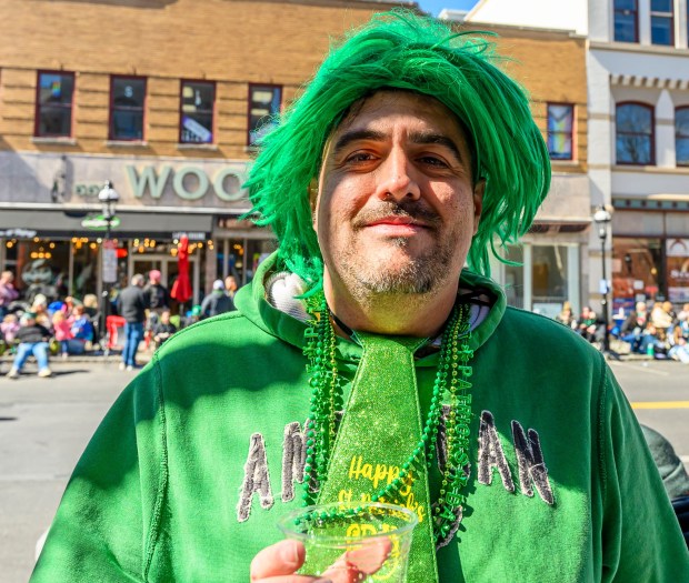 Chris Burkos of Whitehall enjoys the festivities Saturday, March 14, 2026, during the 16th annual Parade of Shamrocks in downtown Bethlehem. The parade was presented by the Celtic Cultural Alliance and Historic Hotel Bethlehem. The St. Patrick's Day celebration featured pipe bands, school marching bands and community groups, starting on Broad Street and ending under the Hill-To-Hill Bridge.(April Gamiz/The Morning Call)