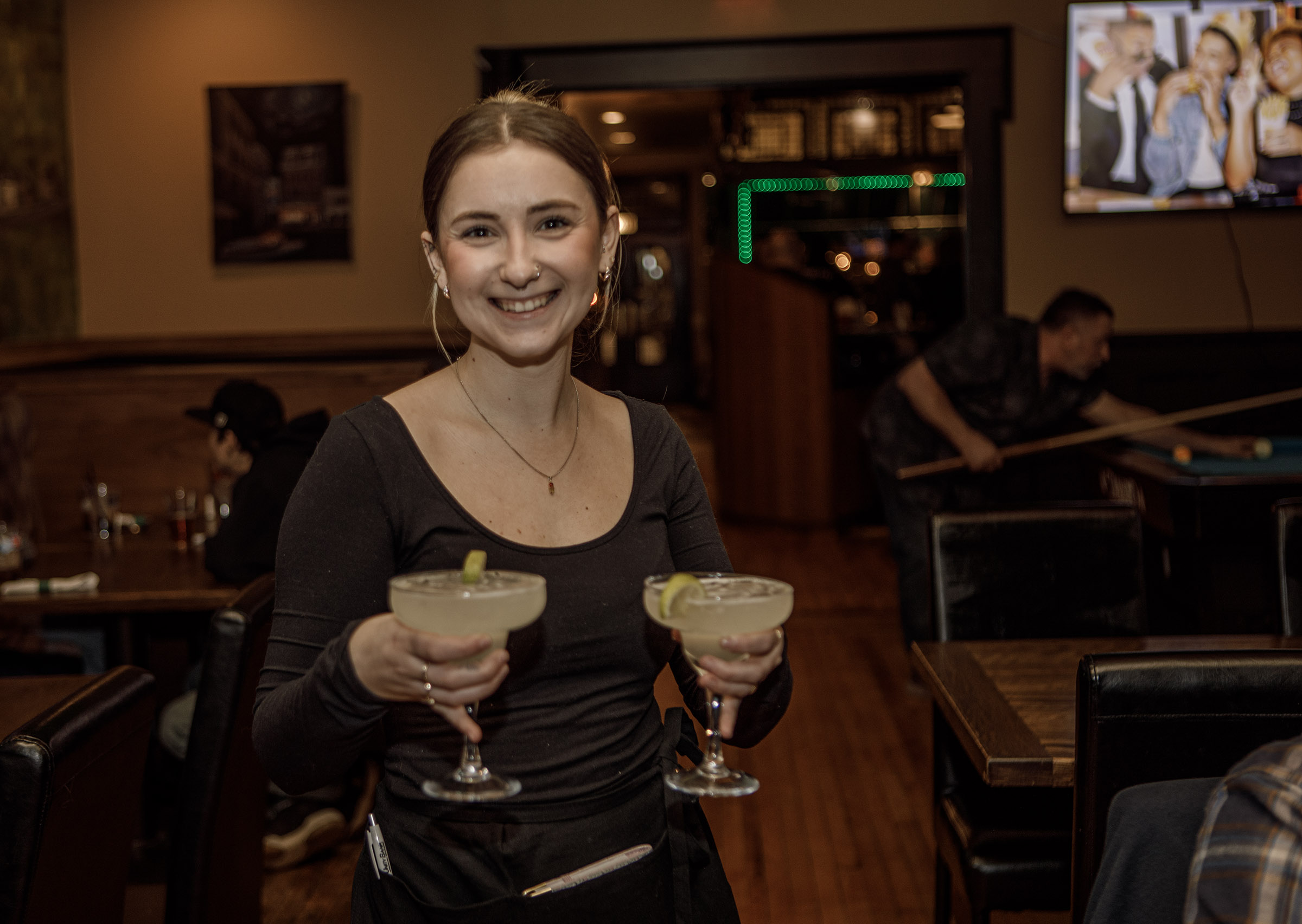Olivia Delong of Allentown serves drinks at Pearly Baker’s Alehouse,...