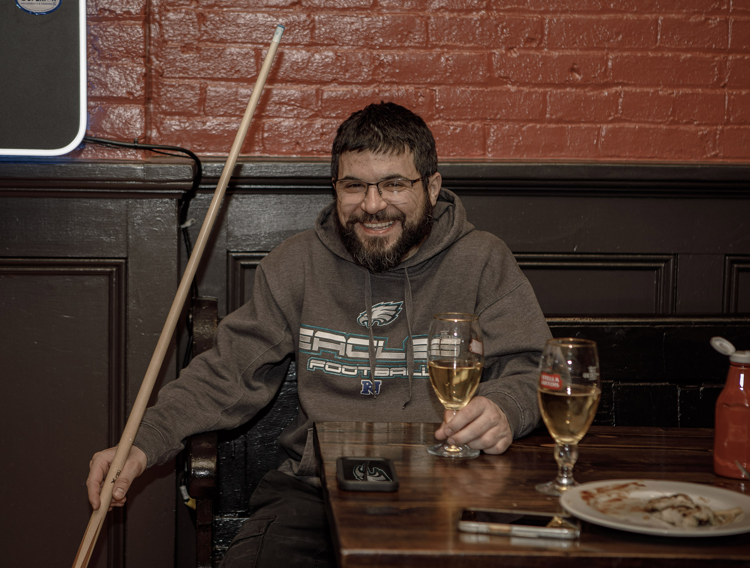 Ra Umarov of Easton plays pool at Pearly Baker’s Alehouse,...